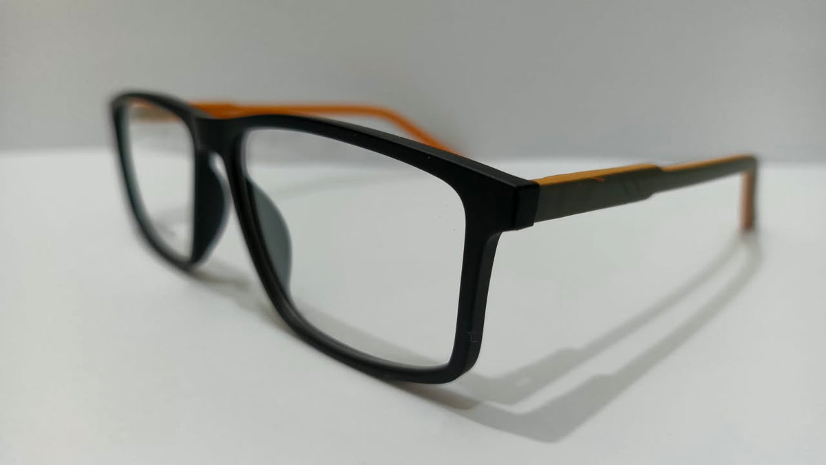 Angled view of DH860011 black rectangular eyeglasses with orange temple accents