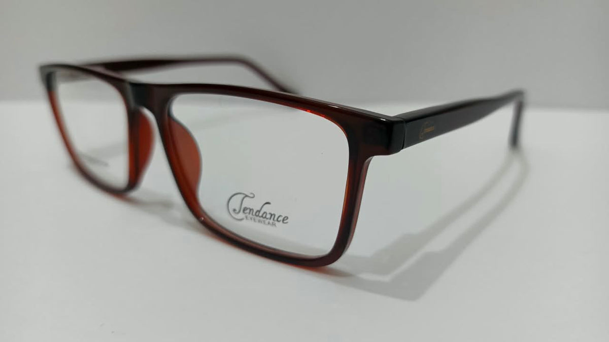 Angled view of translucent burgundy full-rim eyeglasses