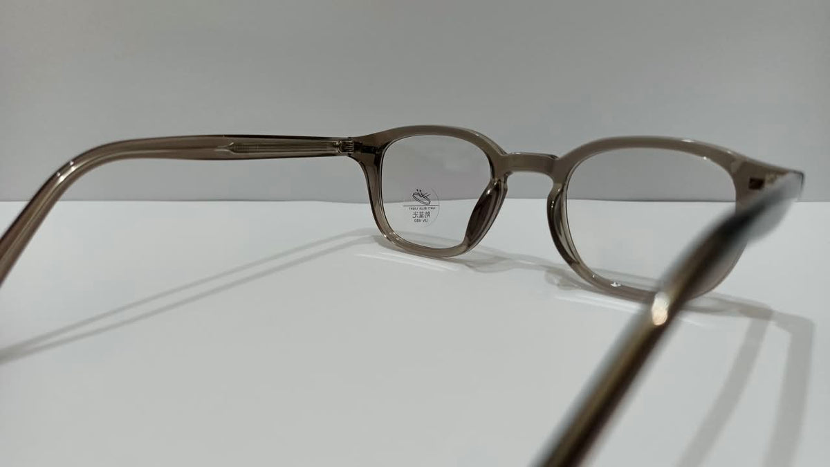 Rear angled view showing temples of smoky taupe eyeglasses