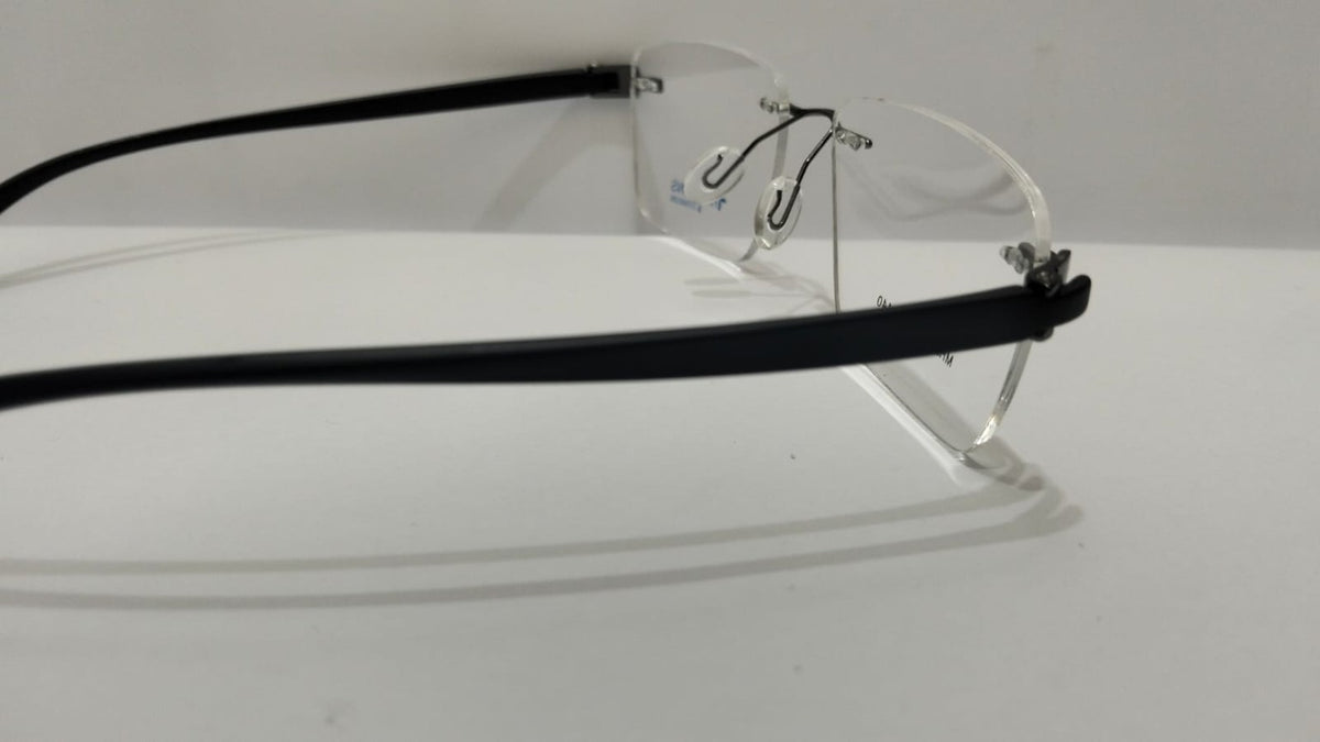 Side view of Harisons MH2010 black temple rimless eyeglasses