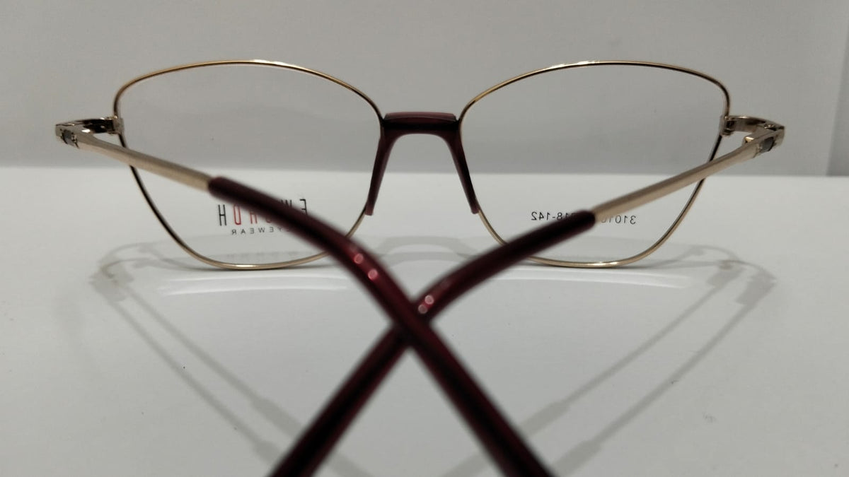 Top view of gold-tone full-rim glasses with burgundy arms