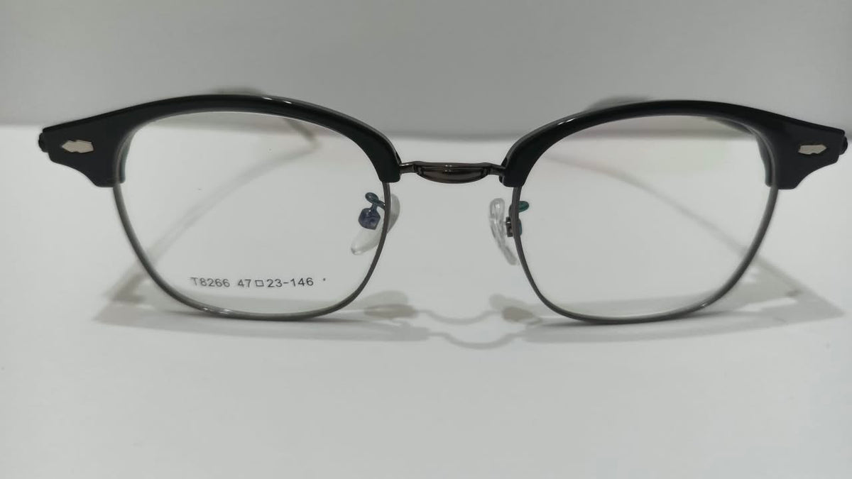 Front view of shiny black browline half-rim glasses