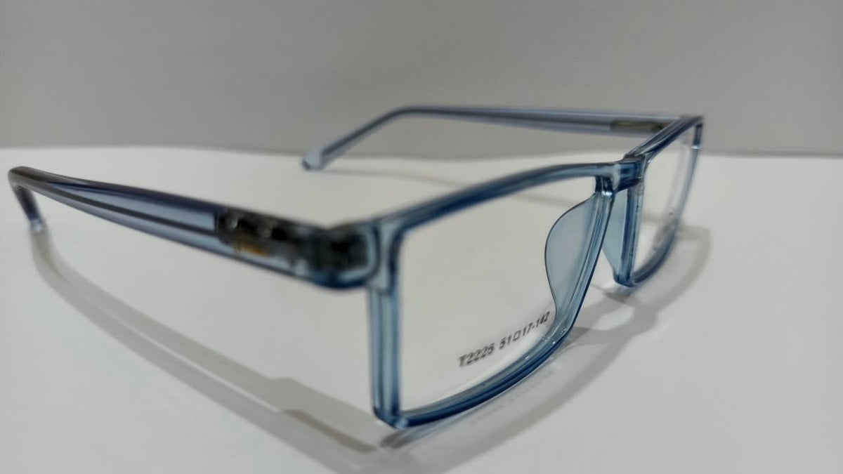 Angled close-up of the translucent blue T2225 eyeglass frame