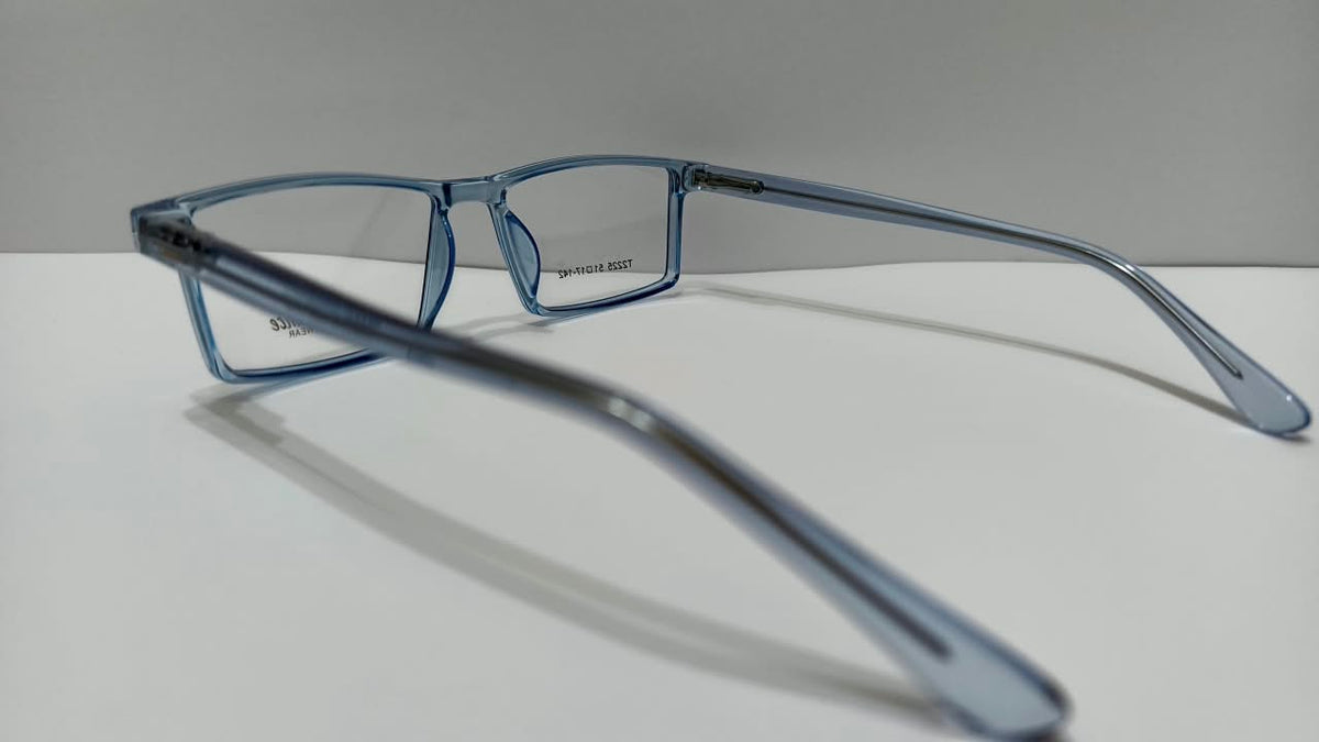 Side view of Tendance T2225 translucent blue eyeglasses