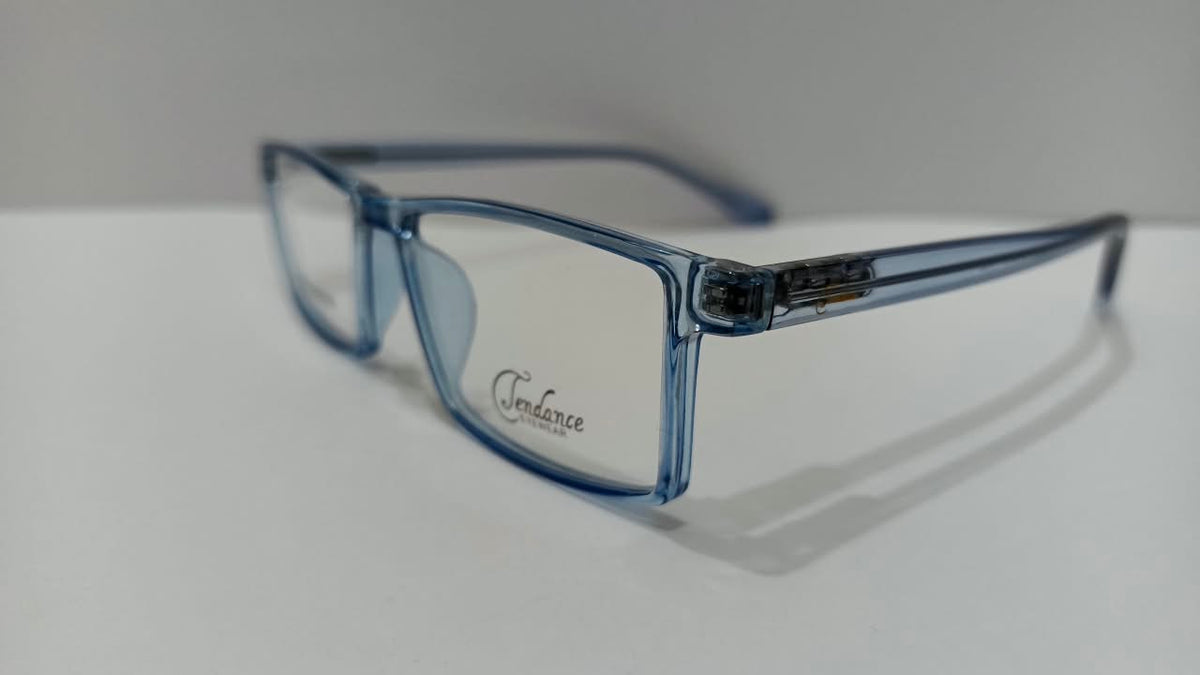 Three-quarter view of Tendance T2225 translucent blue eyeglasses
