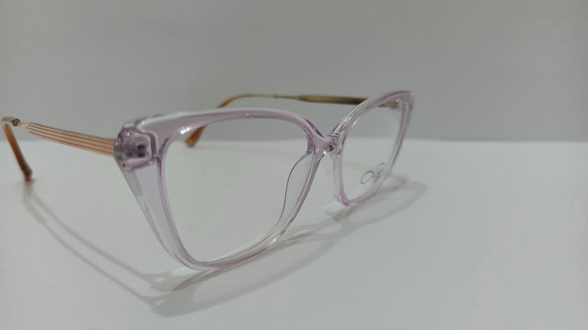 Translucent pinkish-purple eyeglasses with sand-tone temples, three-quarter view