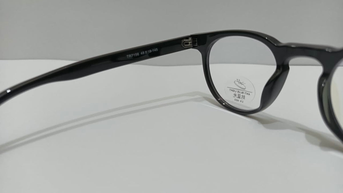 Black eyeglass temple showing model and frame size marking