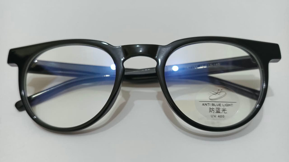 Front view of black round eyeglasses with blue-tone temples and lens label