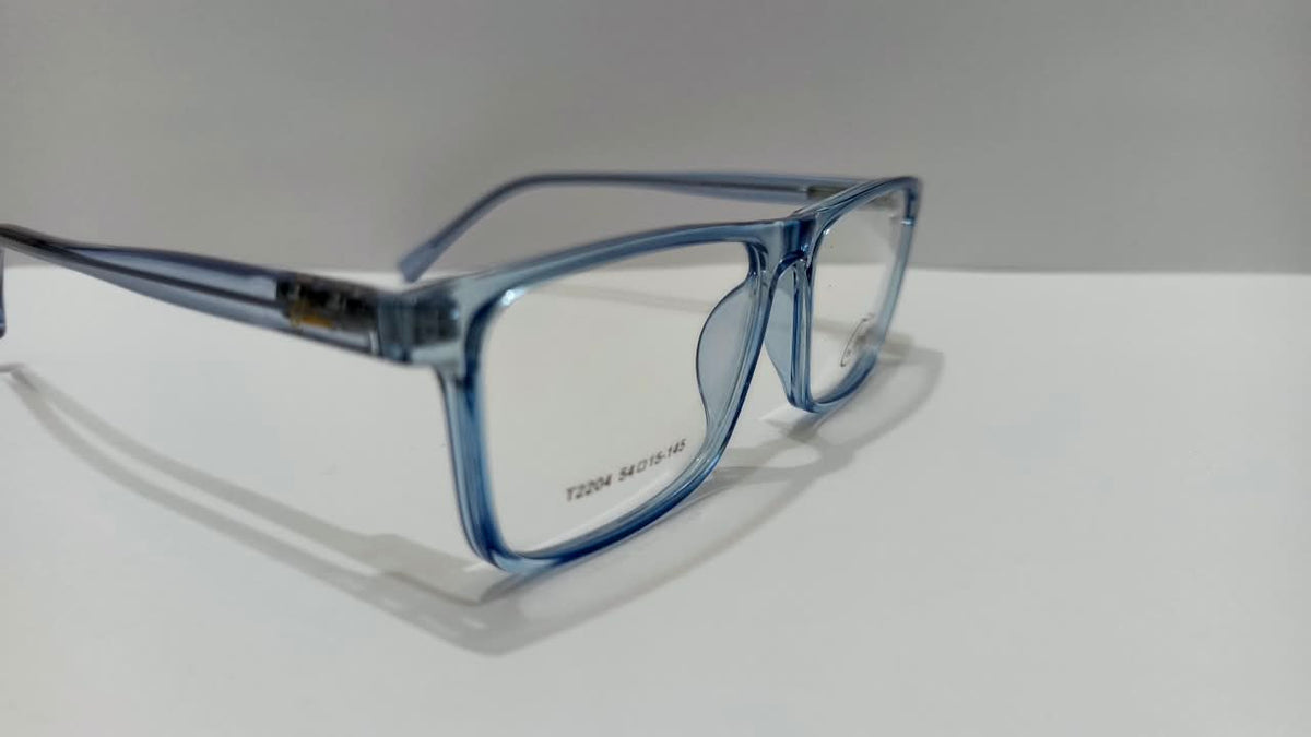 Three-quarter view of translucent blue rectangular eyeglasses