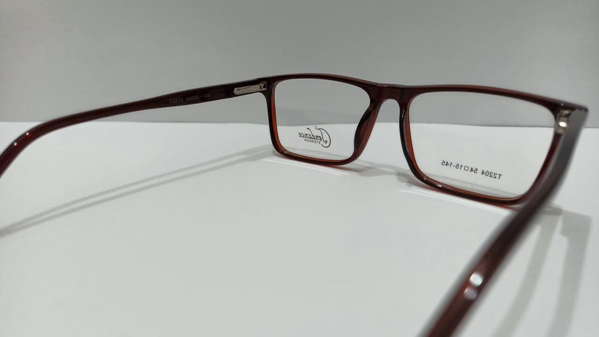 Side view of burgundy rectangular eyeglasses with dark temples
