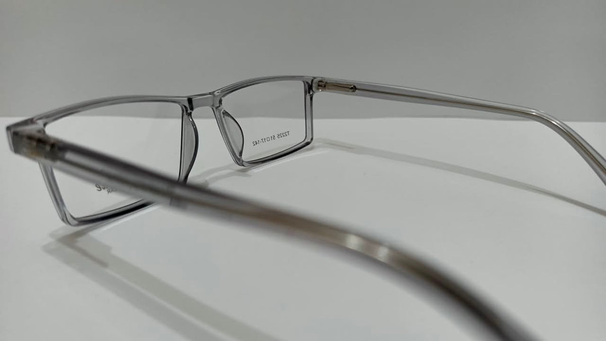 Translucent smoke-gray Tendence T2204 eyeglasses, angled side view