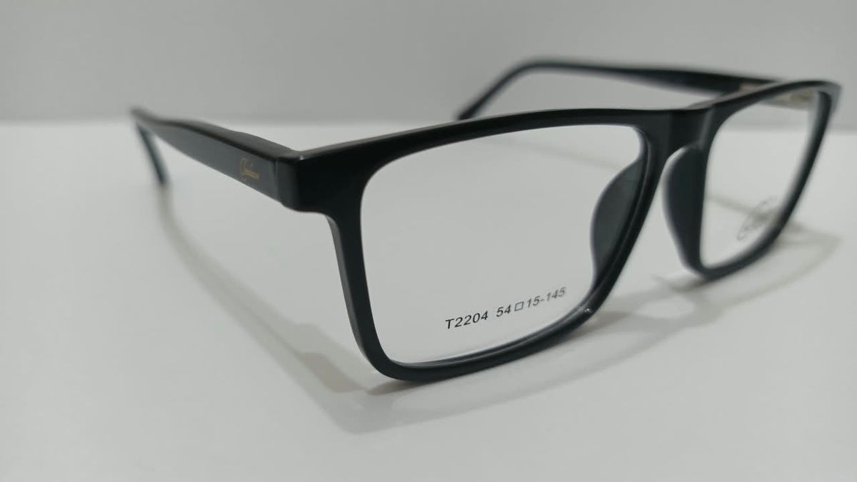 Front three-quarter view of black Tendence T2204 eyeglasses
