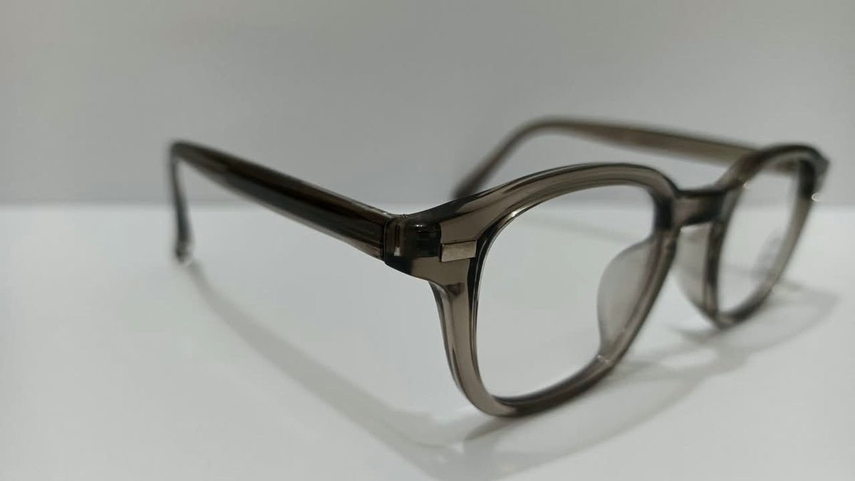 Angled view of smoky taupe translucent full-rim eyeglasses