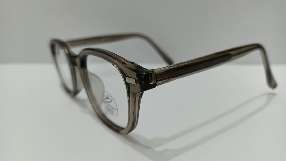 Side view of smoky taupe translucent eyeglasses