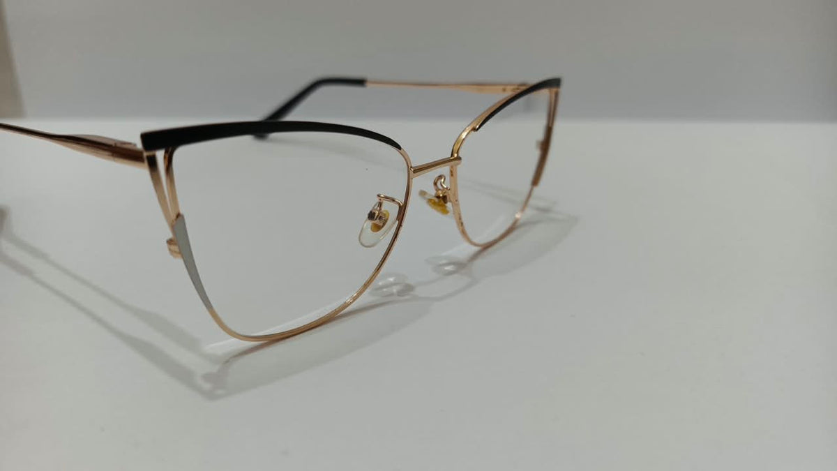 Black and gold cat-eye eyeglasses, angled front view