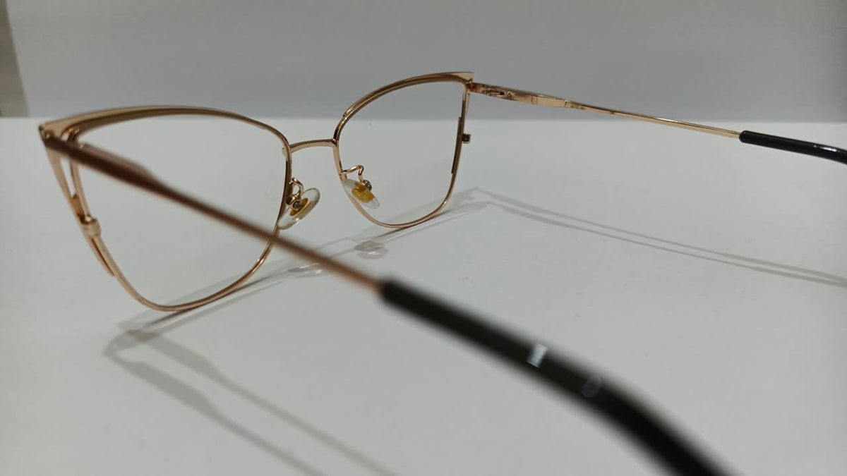 Black and gold eyeglasses, inner frame and temple view