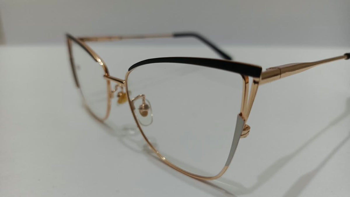 Black and gold cat-eye eyeglasses, side detail