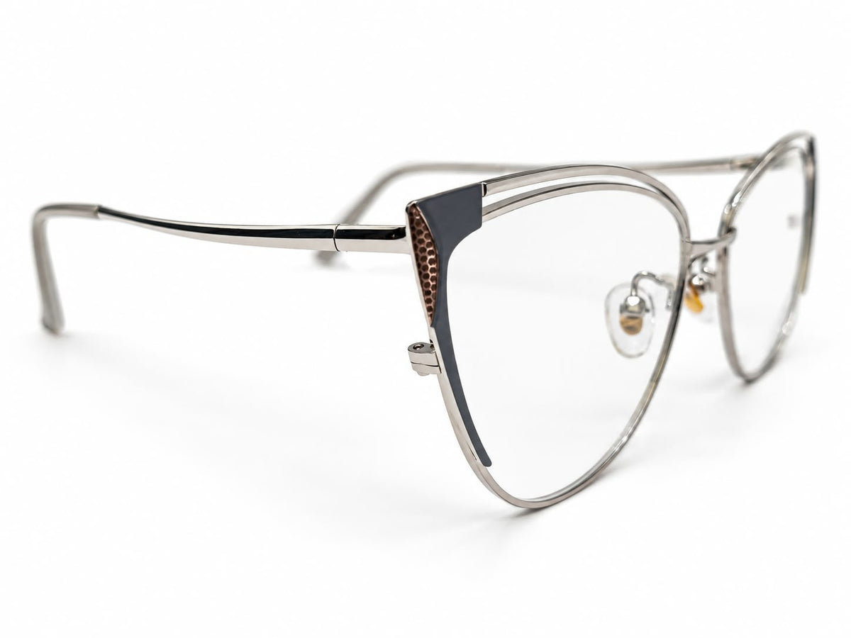 Ladies slate grey and silver-tone cat-eye prescription eyeglasses with gold-tone corner details, size 52-17-134