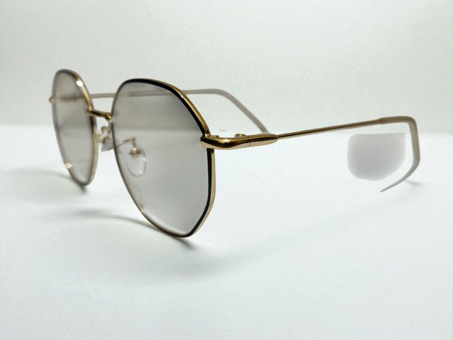 Premium Octagon Rimless Eyewear – Golden Frame with Gradient Lenses | Bird Eye Optics