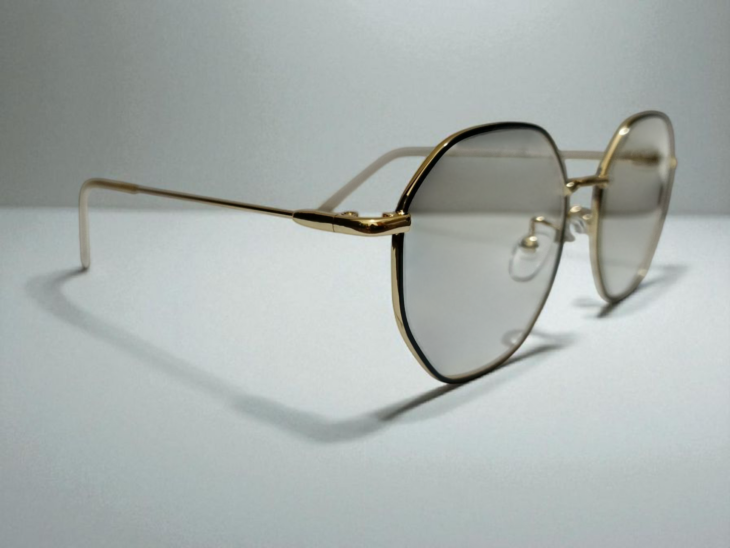 Premium Octagon Rimless Eyewear – Golden Frame with Gradient Lenses | Bird Eye Optics