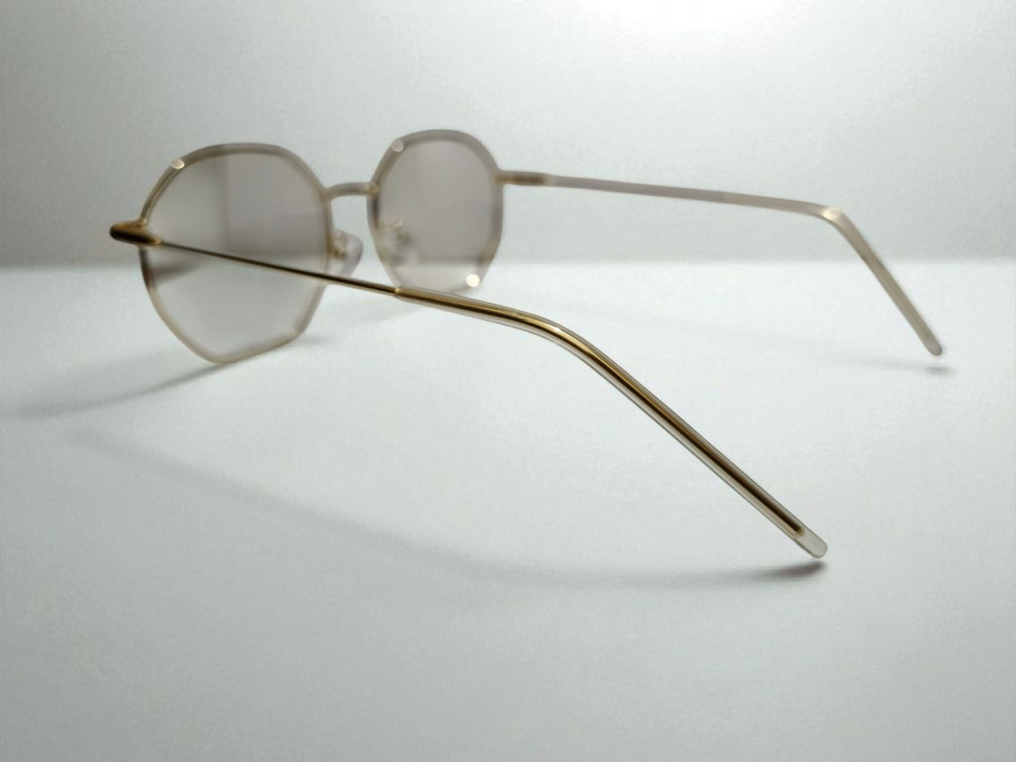 Premium Octagon Rimless Eyewear – Golden Frame with Gradient Lenses | Bird Eye Optics